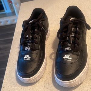 Black and white Nike Air Force 1.